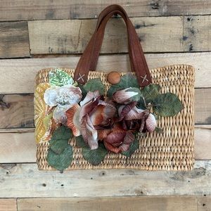 Wicker purse with floral embelishment